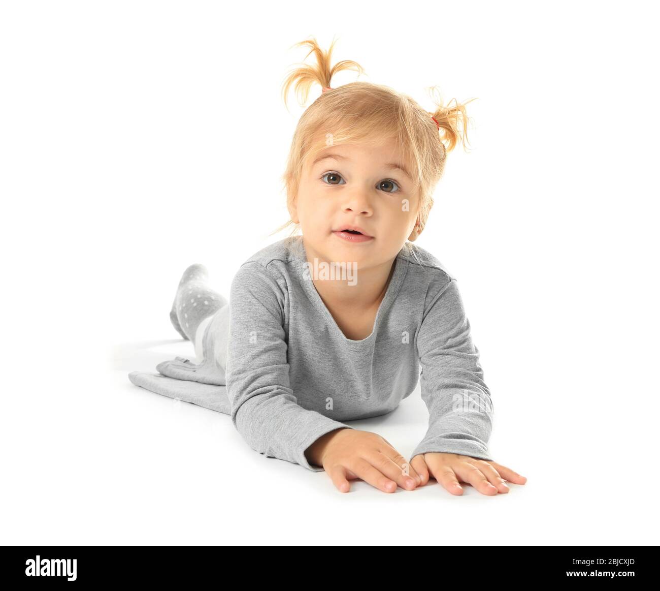Adorable little girl isolated on white Stock Photo - Alamy