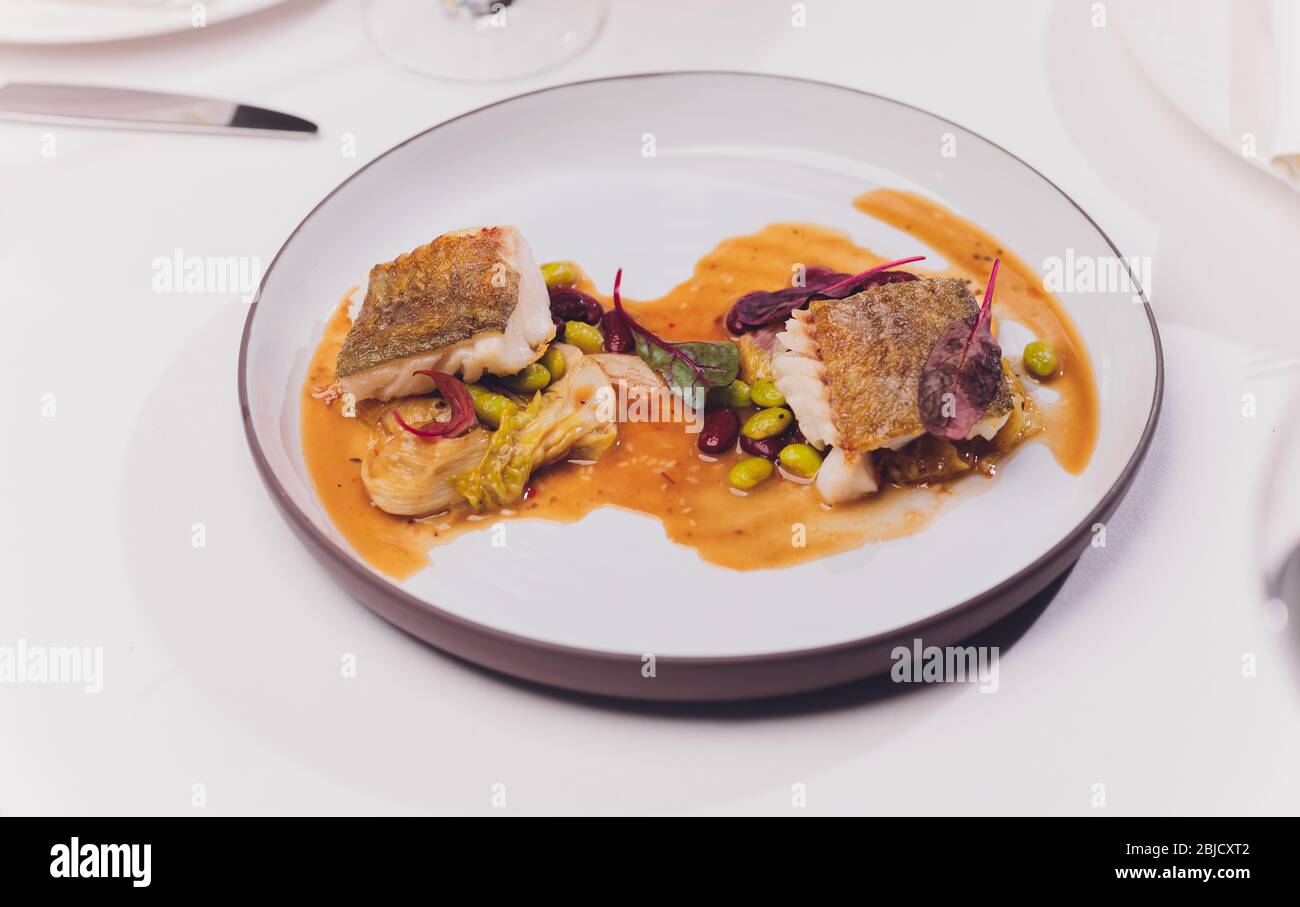 Boiled Code Fish Meal of Boiled Cod Fish with black olives and green beans Stock Photo ...