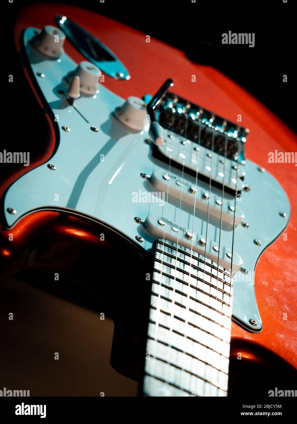 Detail of a Red Stratocaster Design Copy Electric Guitar, Electric