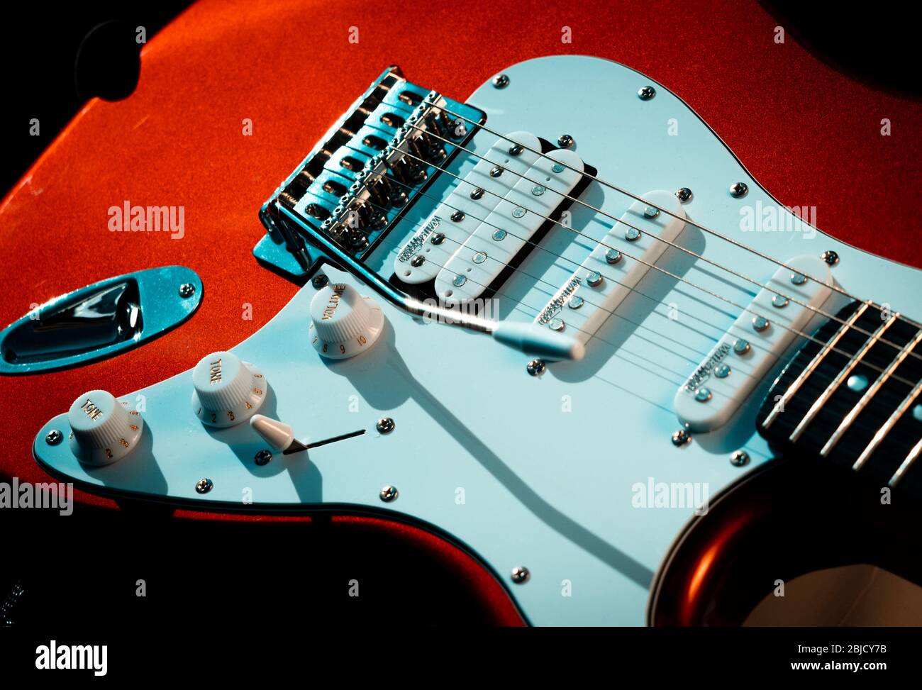 Detail of a Red Stratocaster Design Copy Electric Guitar, Electric