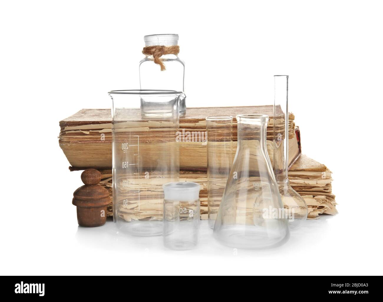 Vintage books and bottles isolated on white Stock Photo Alamy