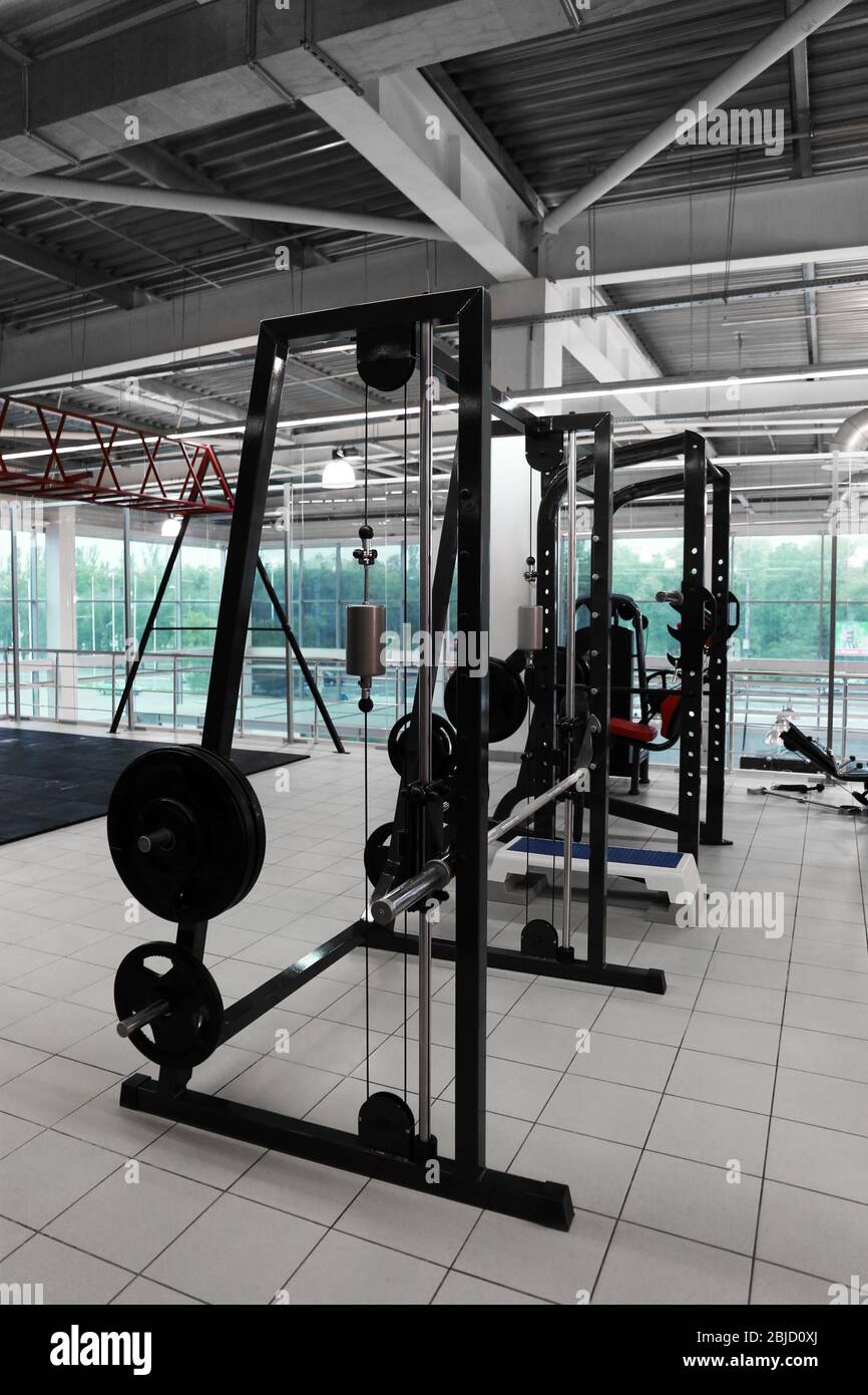 Weight lifting machines in gym Stock Photo Alamy