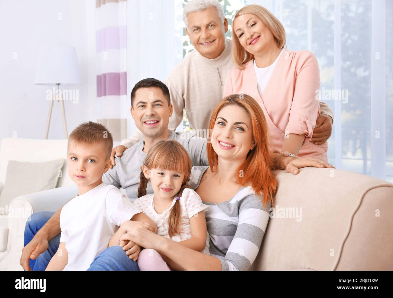 Big family sitting on hi-res stock photography and images - Alamy
