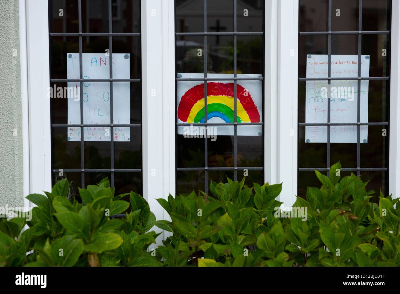 Thaxted, UK. 29th Apr, 2020. Coronovirus Lock Down. Thaxted Essex England. Rainbow salutes to NHS and all essential workers. 29 April 2020 Childrens drawings of a rainbow decorate many windows in Thaxted Essex UK as a show of support for the NHS (National Health Service) and all essential workers during the Coronavirus pandemic lock dow. Photograph by Credit: BRIAN HARRIS/Alamy Live News Stock Photo