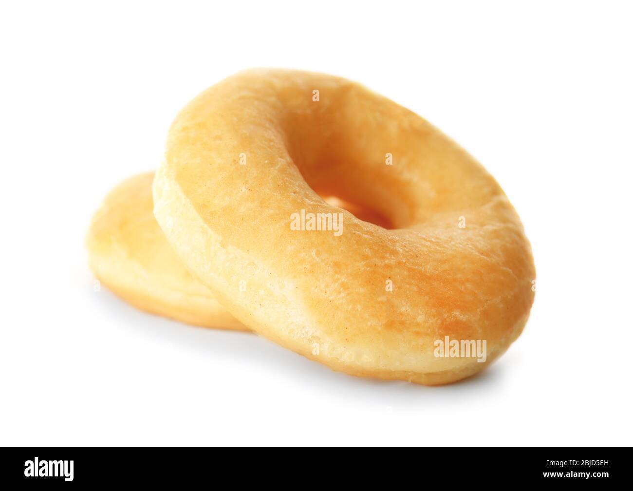 Delicious donuts on white background Stock Photo - Alamy