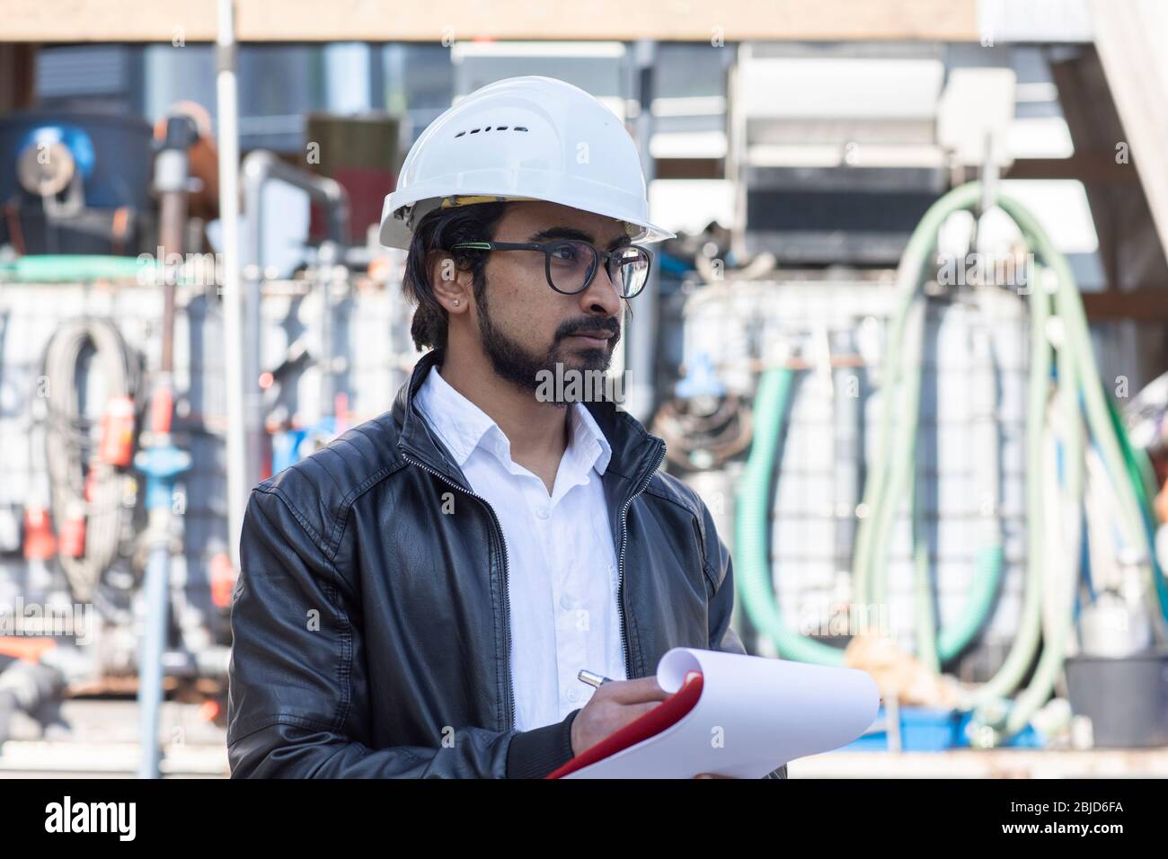 service engineer  working outside with helmet Stock Photo