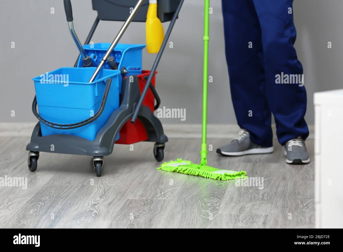 Person moping hires stock photography and images Alamy
