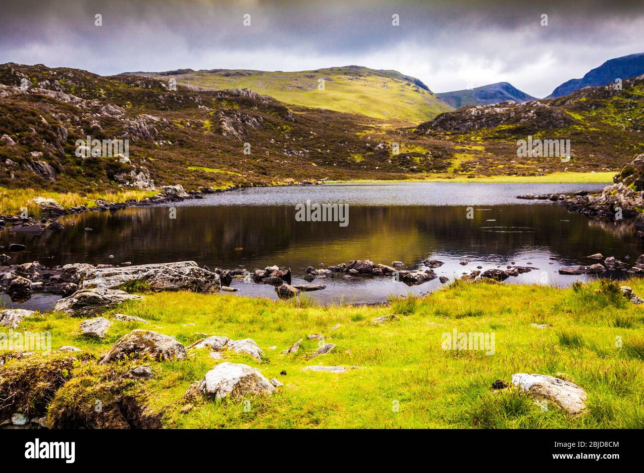 Innominate Tarn on the summit of Haystacks in the Lake District, Cumbria, England, UK Stock Photo