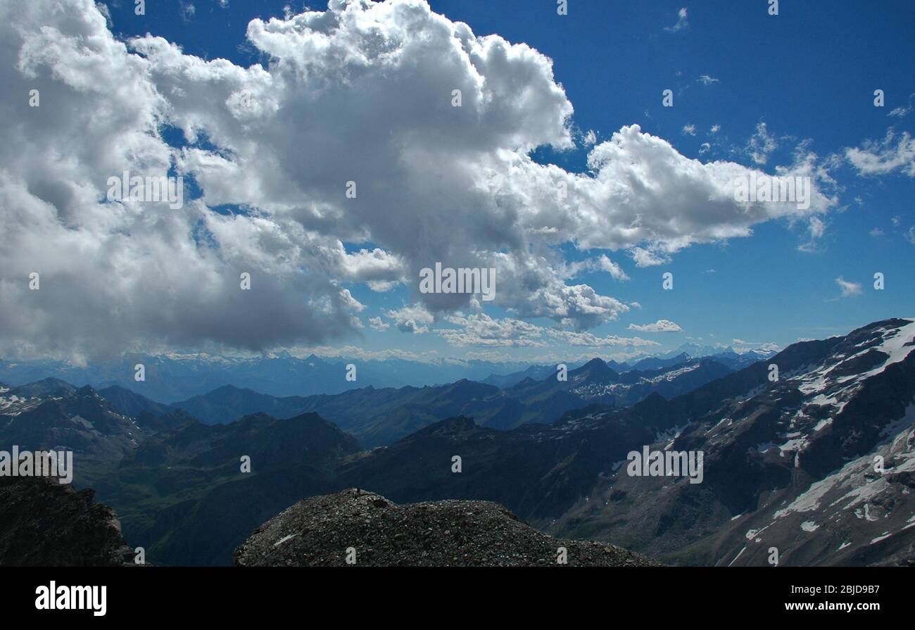 Over view of alpine landscape against cloudy sky, Gressoney, Aosta Valley,Alps Italy Stock Photo