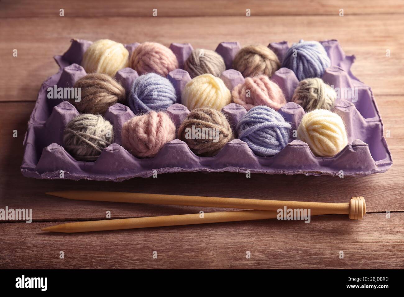 Balls of knitting yarn in package Stock Photo - Alamy