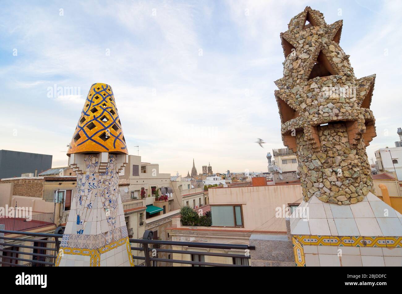Barcelona, Spain - September 20, 2014: Design of the roof of Palace Guell - Gaudi Chimney: broken tile mosaics and strange decorated chimneys are evid Stock Photo