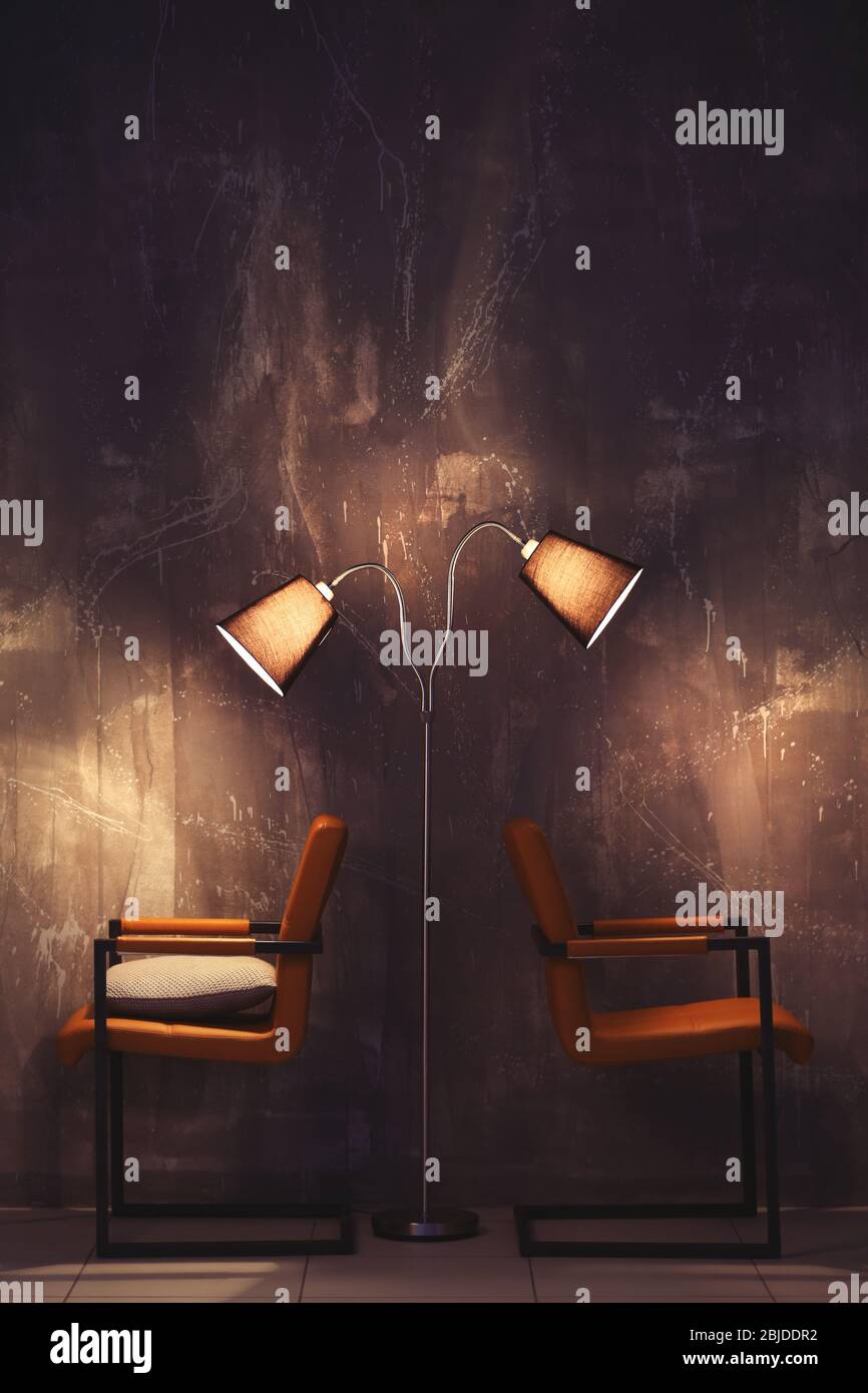 Modern chairs on wall background Stock Photo Alamy