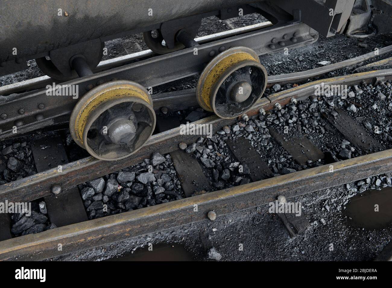 ZAMBIA, Sinazese, chinese owned Collum Coal Mine, underground mining of hard coal for copper melter and cement factory, rail track for coal wagon /SAMBIA, Collum Coal Mine eines chinesischem Unternehmens, Untertageabbau von Steinkohle, Schiene fuer Loren Stock Photo
