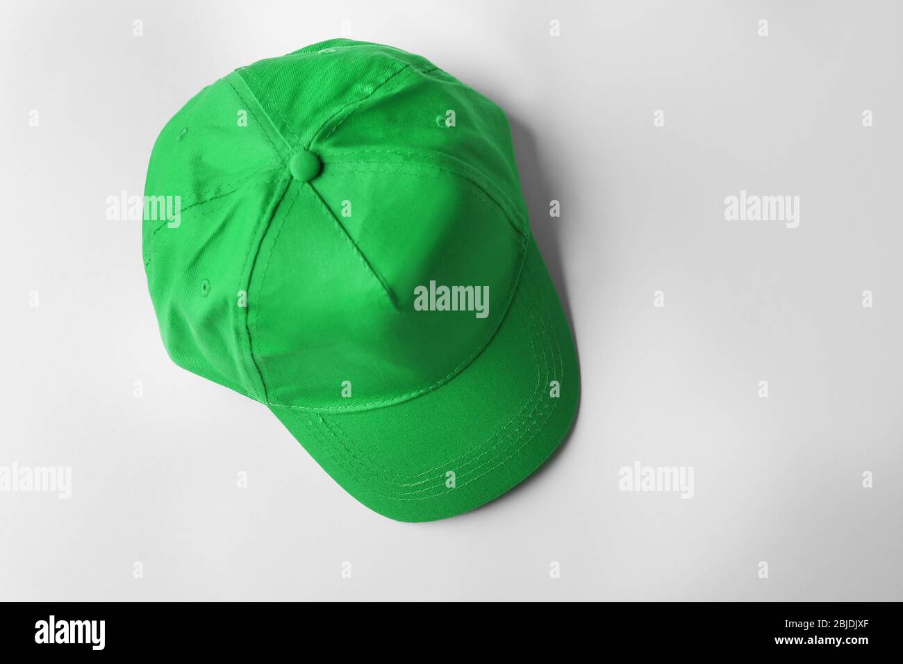 Blank green baseball cap on white background Stock Photo - Alamy