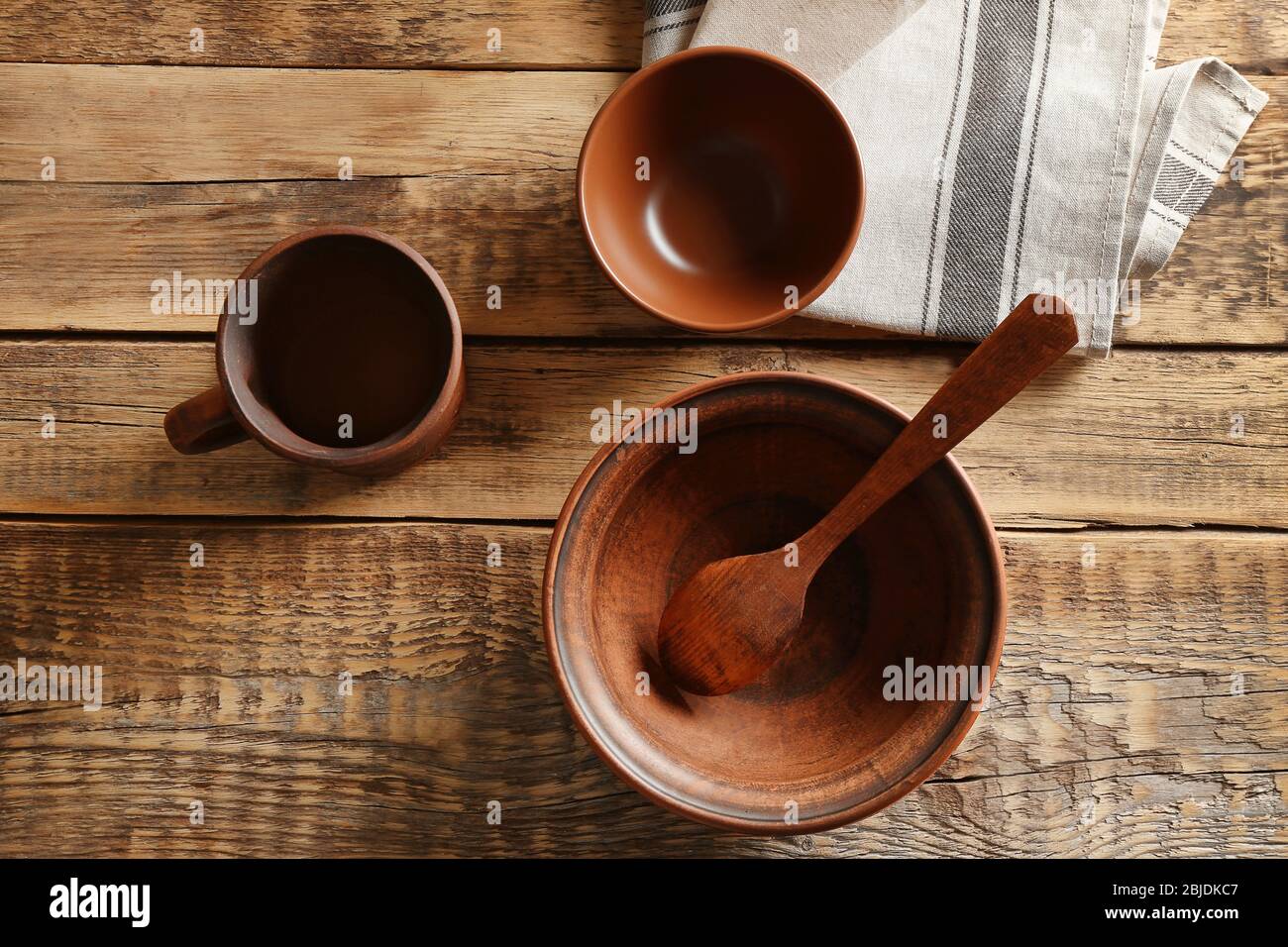 Set of dinnerware on wooden table, top view Stock Photo - Alamy