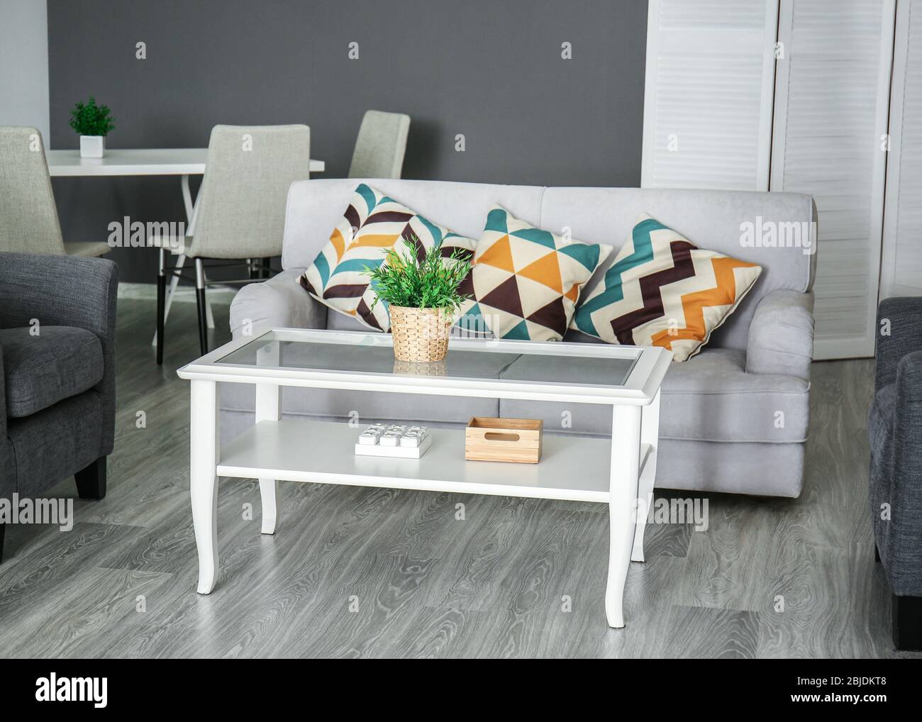 Modern living room with sofa and furniture Stock Photo - Alamy