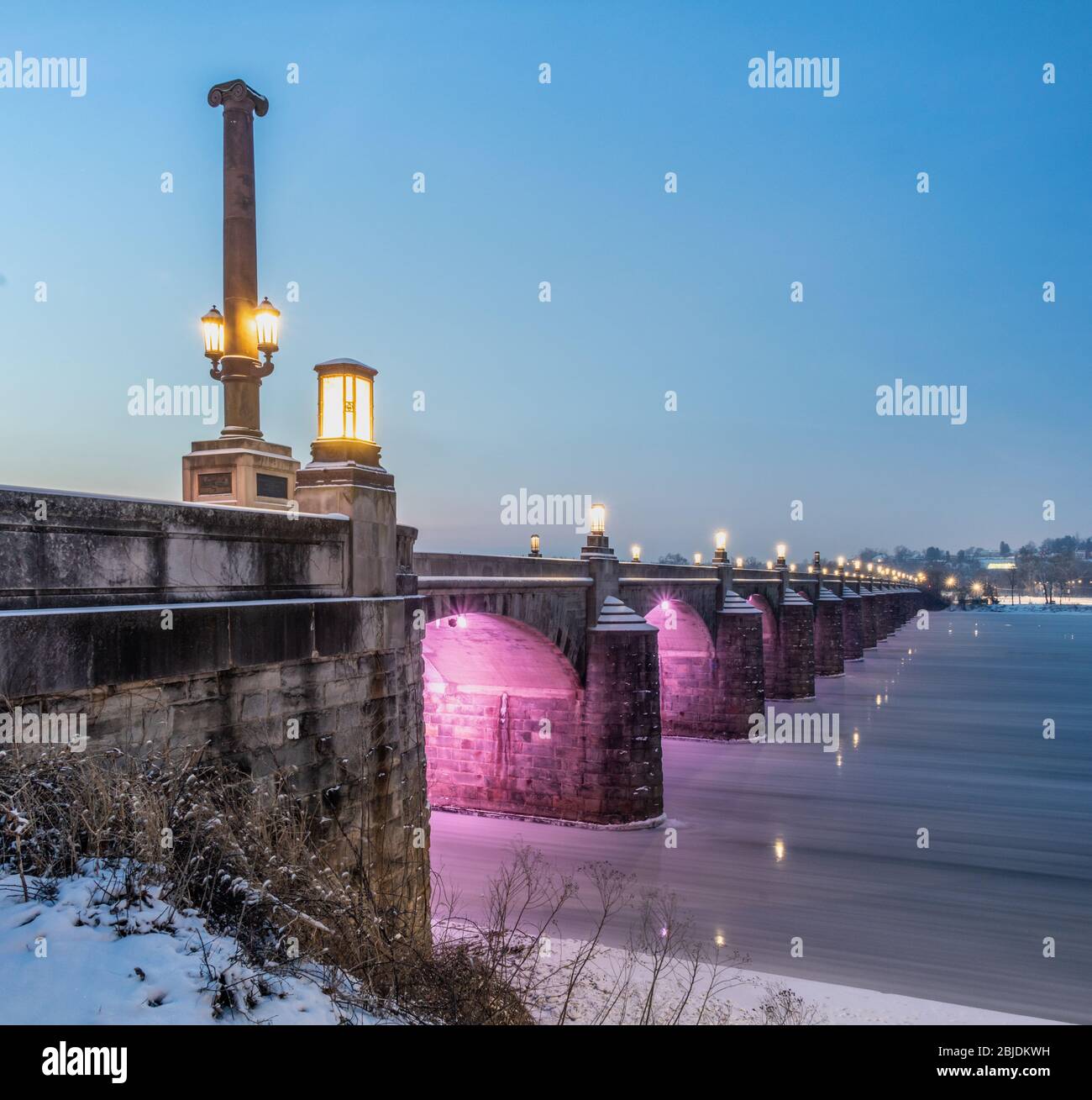 Early morning shot of aclear blue sky over the Market Street Bridge in Harrisburg, PA in winter Stock Photo