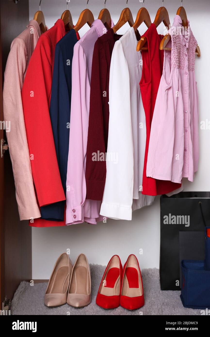 Elegant female clothes in wardrobe, closeup Stock Photo Alamy