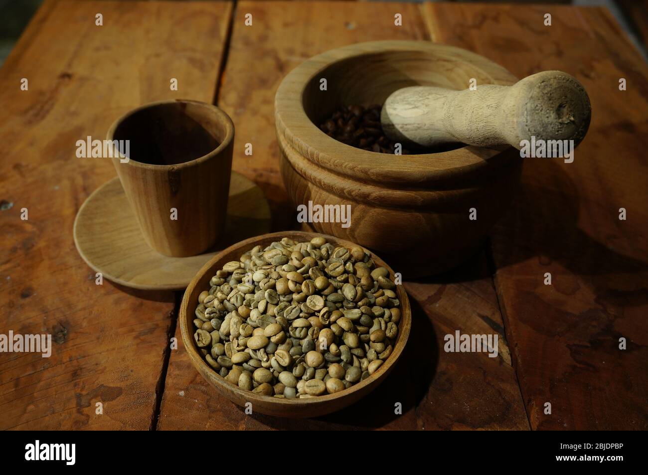 roasted coffee beans and raw ones Stock Photo