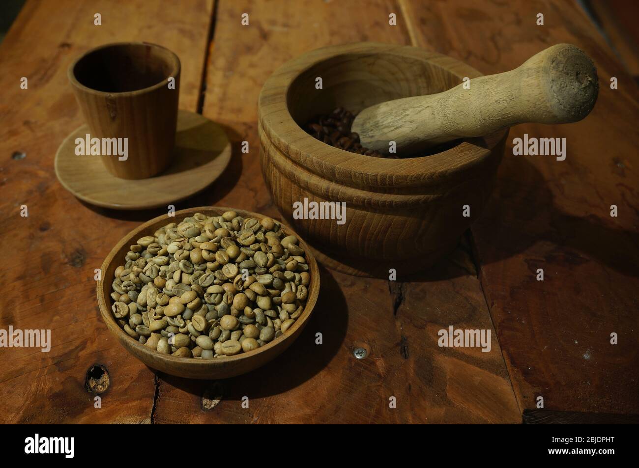 roasted coffee beans and raw ones Stock Photo
