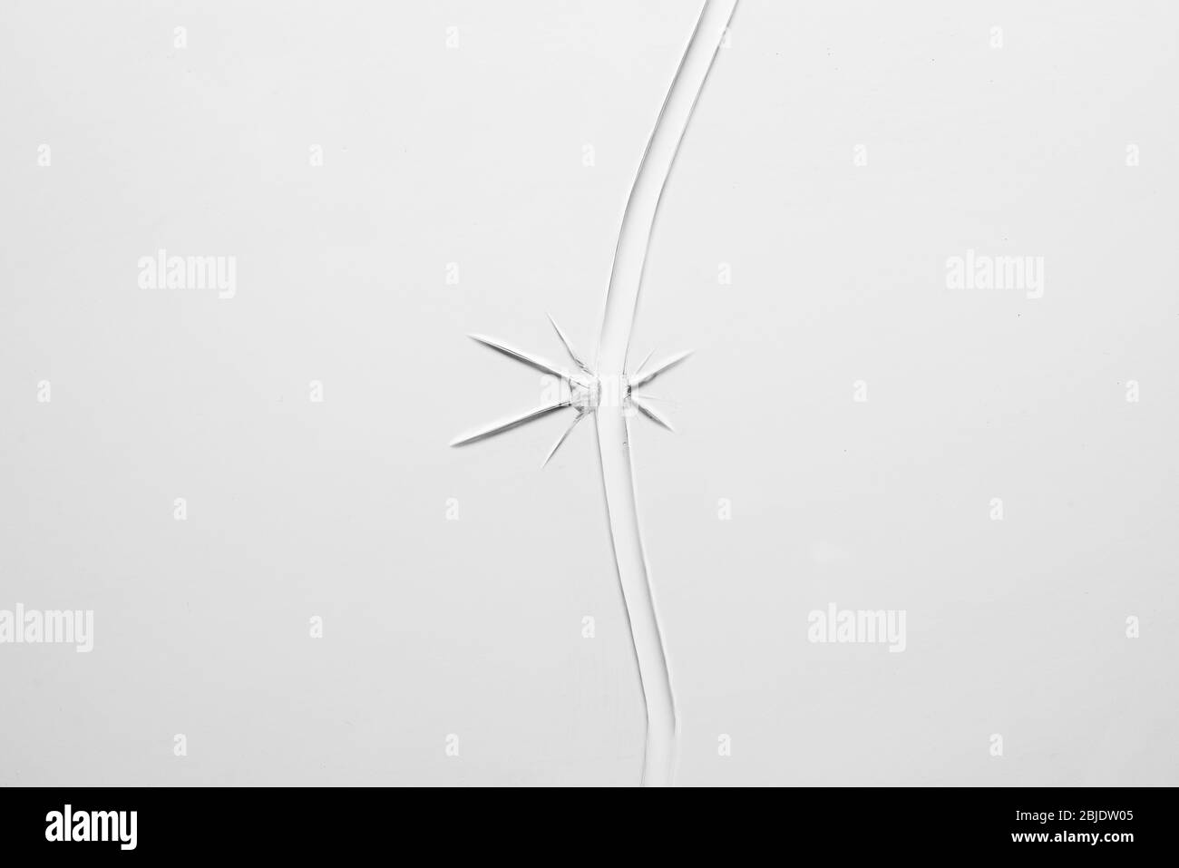 Broken glass. Transparent shards on a white background. Stock Photo
