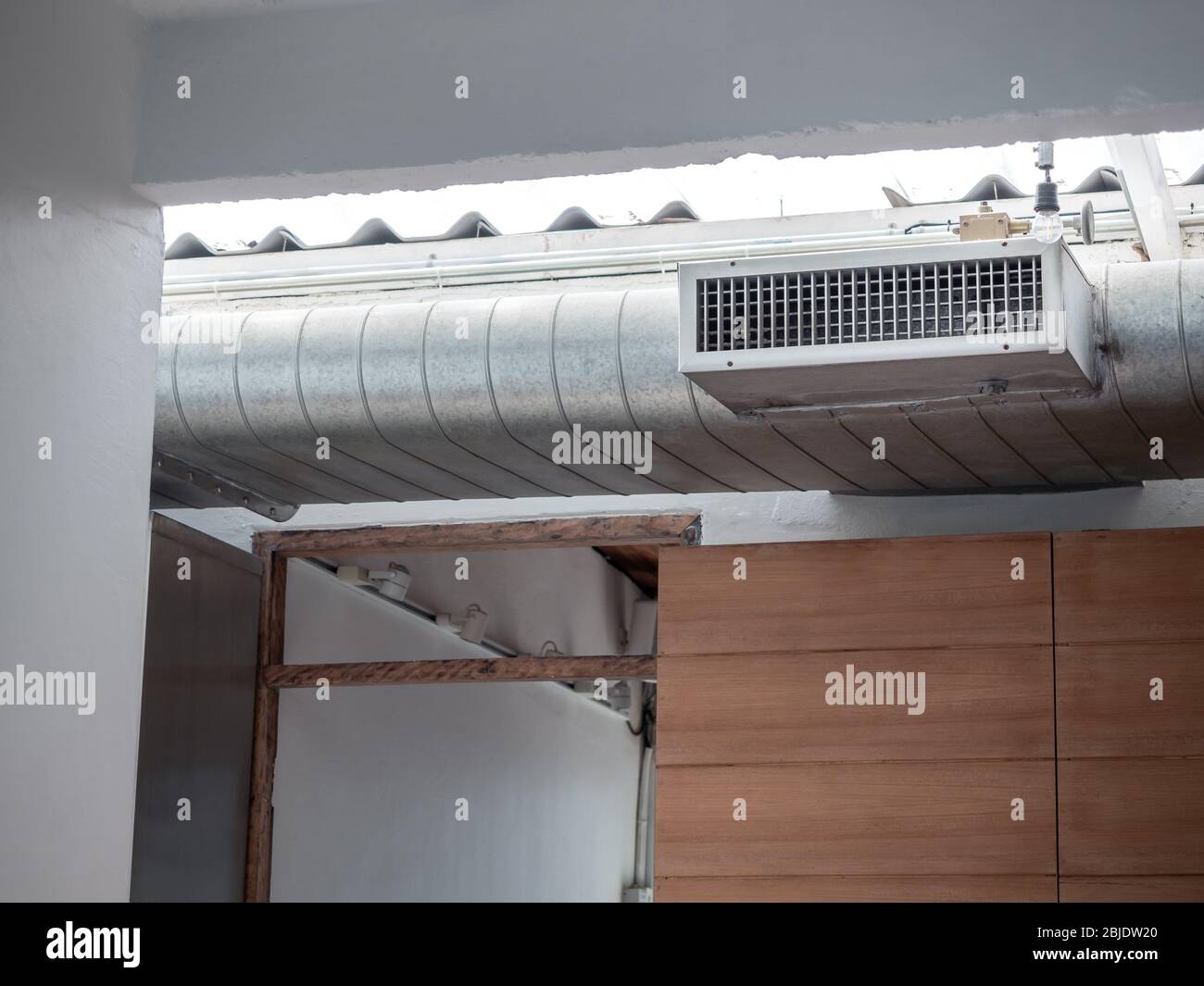 Air cleaner connected exhaust pipe in restaurant Stock Photo Alamy