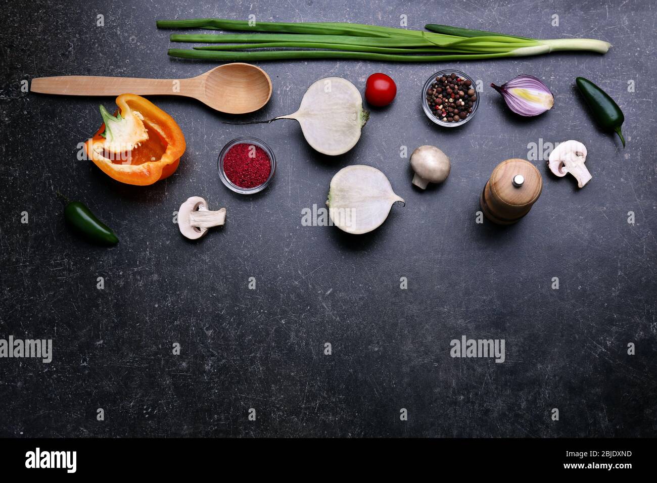 Fresh vegetables and spice on gray background, top view Stock Photo