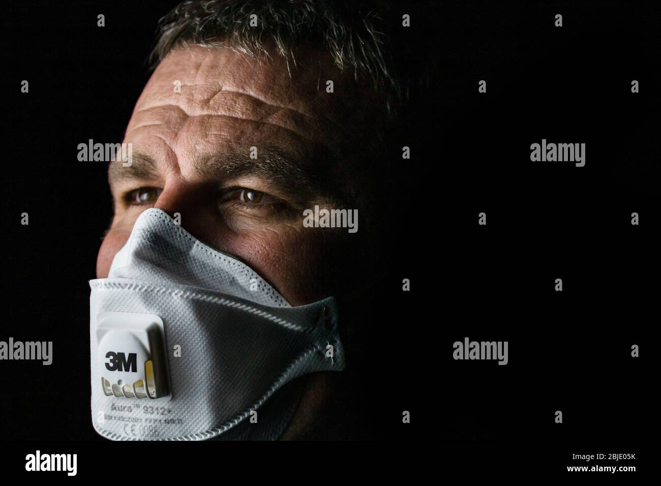 Man with protective 3M medical mask. 3M Aura 9312. The face mask used in  the COVID-19 global pandemic as a protection against coronavirus in  Bucharest Stock Photo - Alamy