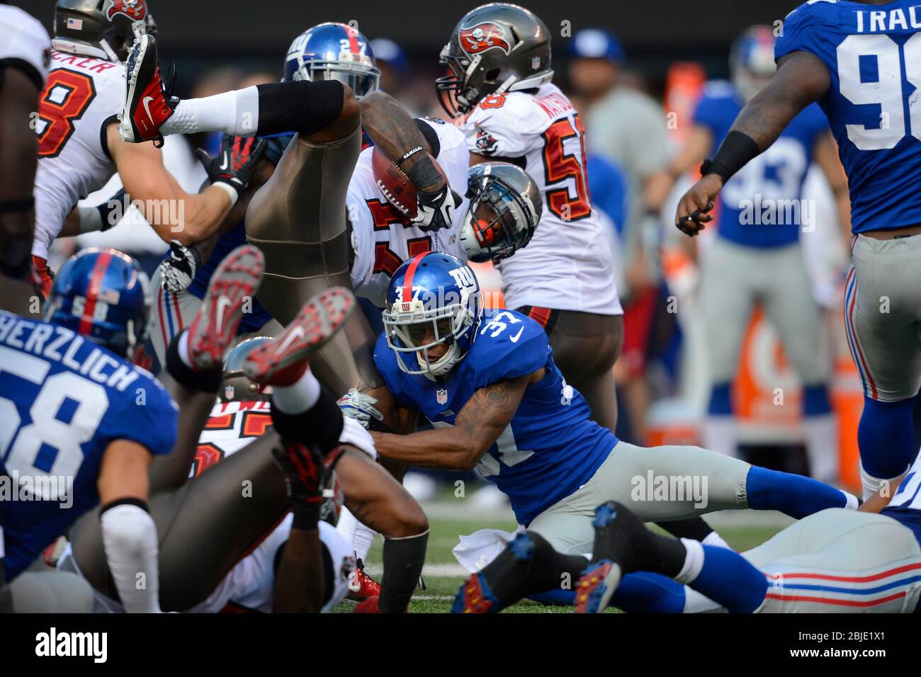 New York Giants defensive back Michael Coe, center, is shown before an NFL  football game between the New York Giants and the Philadelphia Eagles  Sunday, Nov. 20, 2011 in East Rutherford, N.J. (