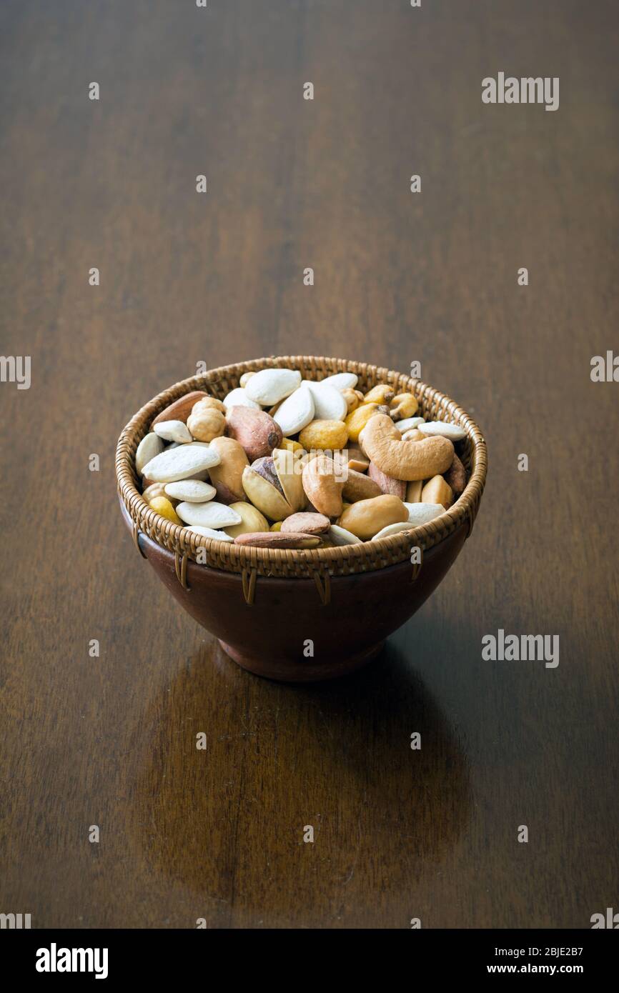 Roasted and salty, mixed nuts and kernels snack Stock Photo