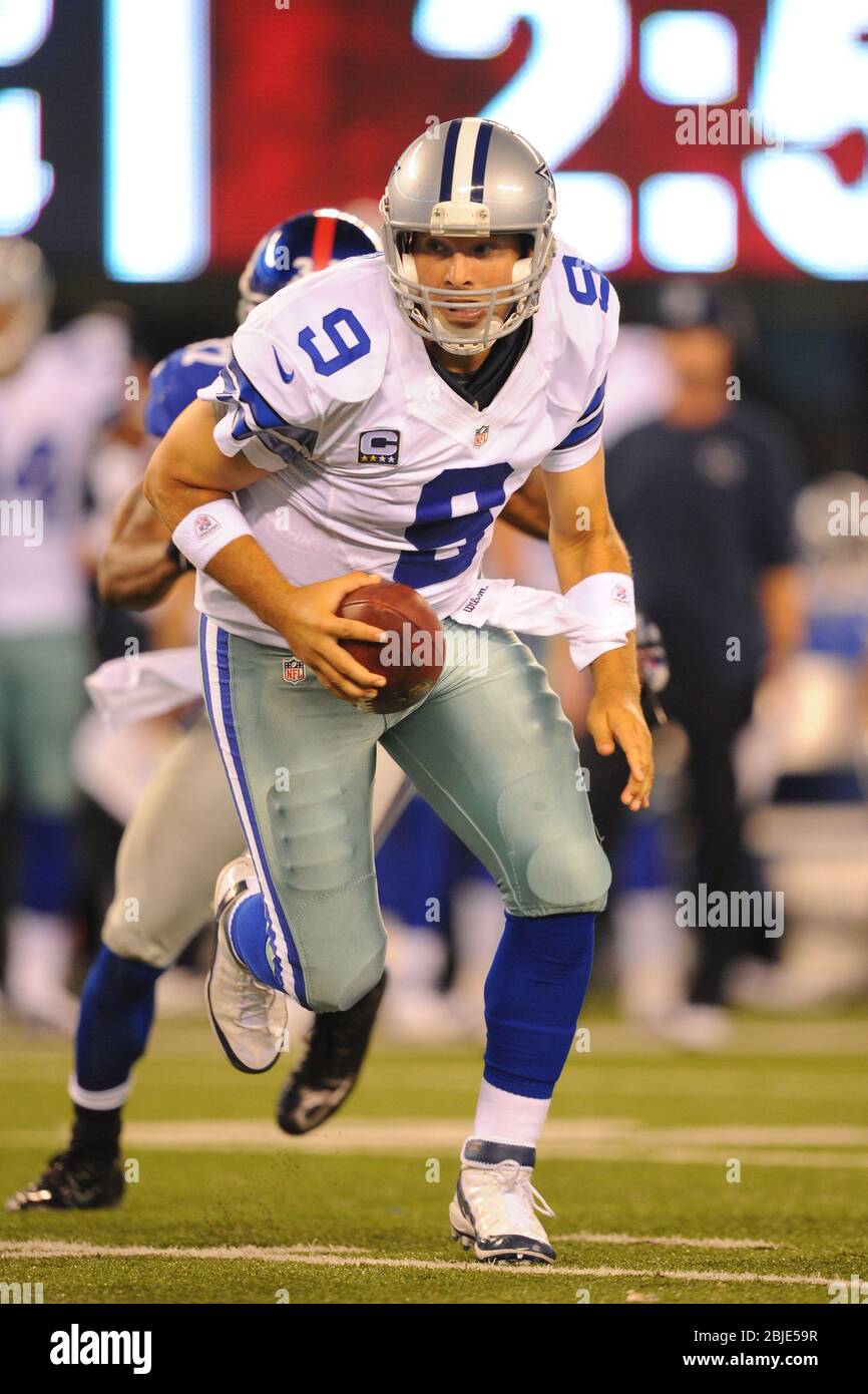 Dallas Cowboys quarterback Tony Romo (9) runs out of the pocket against the  New York Giants in the third quarter in week 1 of the NFL season at MetLife  Stadium in East