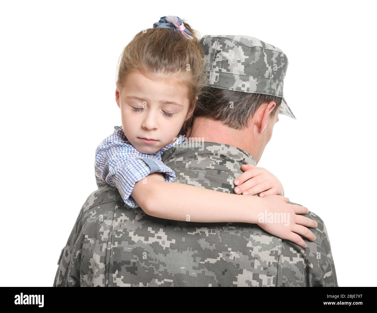 Soldier in camouflage hugging his daughter on white background Stock