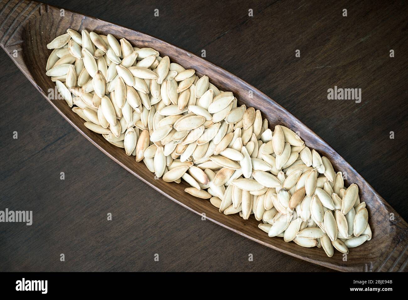 Roasted white melon seeds Stock Photo Alamy