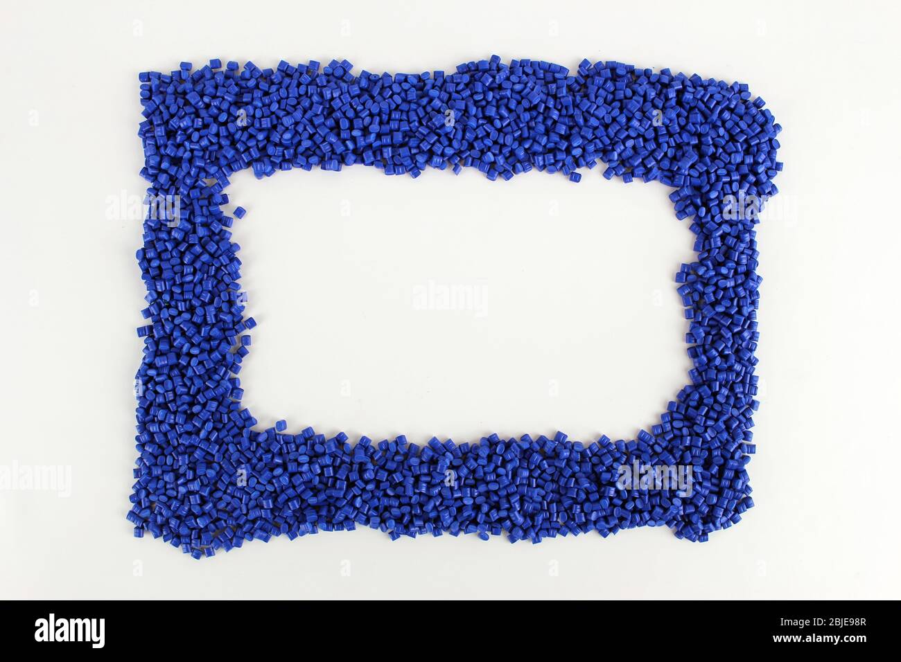 The geometric figure formed by polymers, plastic, which represents a frame with a white background inside. Stock Photo