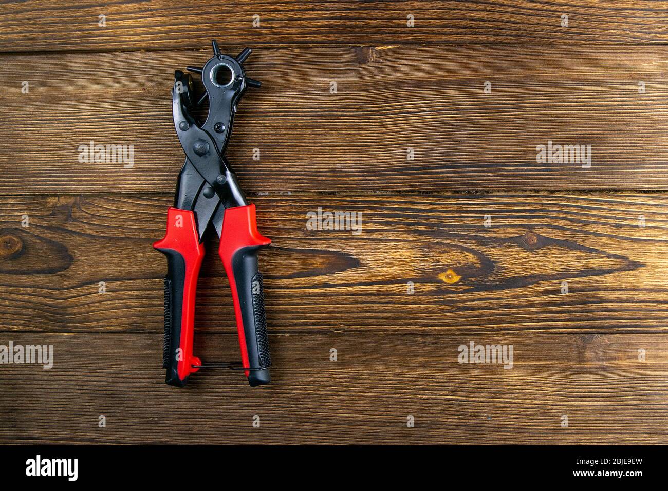 Red metal hole punch hires stock photography and images Alamy