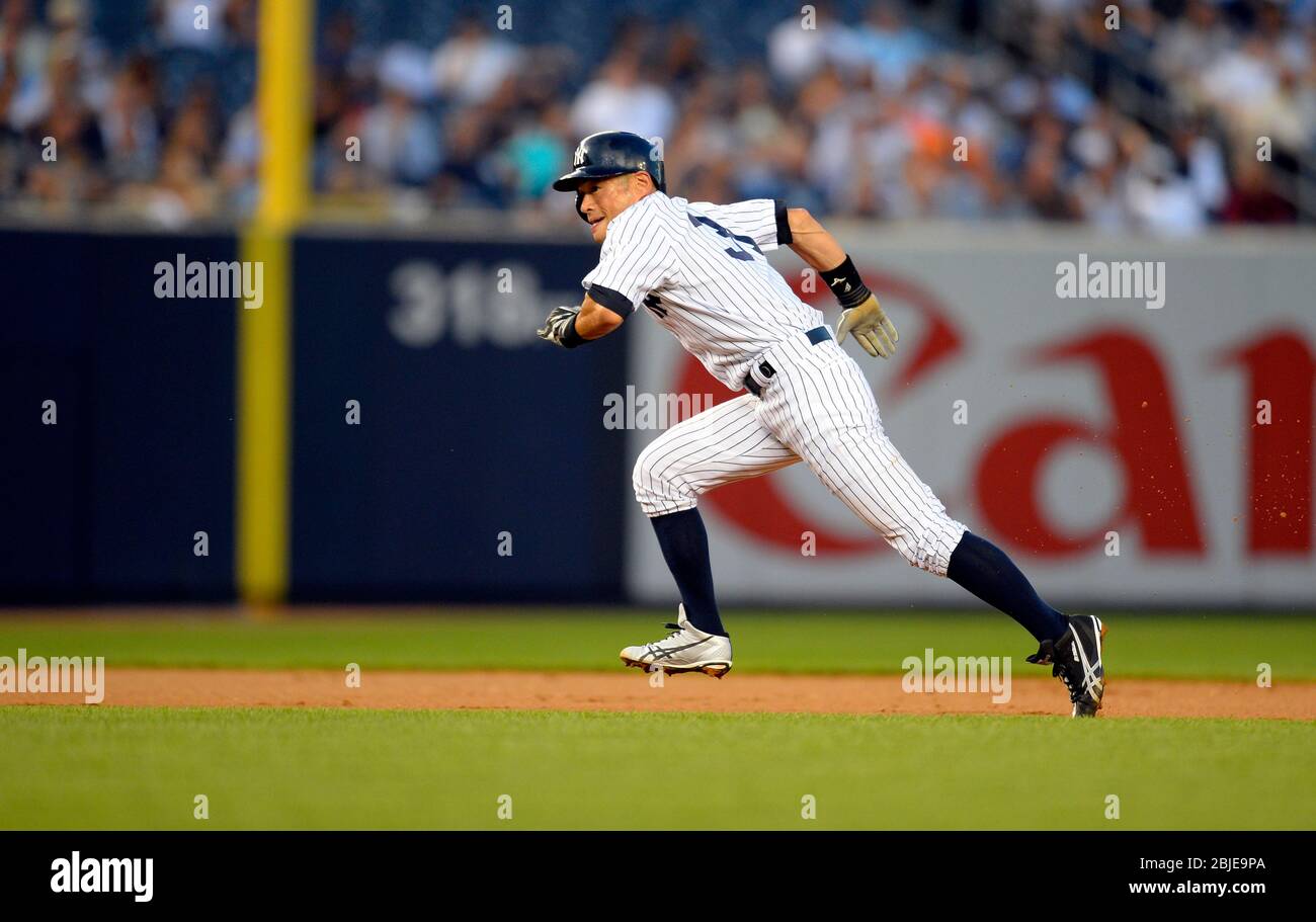 New York Yankees Outfielder Nick Swisher (#33) with his eye on the ball.  The Yankees defeated the Mets 2-1in the game played at Citi fied in  Flushing, New York. (Credit Image: ©