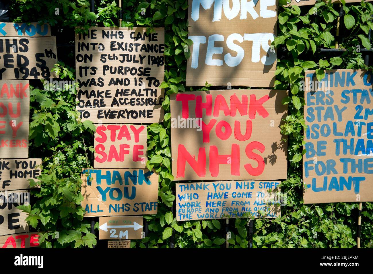 London April 2020 The Covid-19 pandemic. Roman Road, Tower Hamlets. A forest of placards praise all the front line workers, especially the NHS Stock Photo