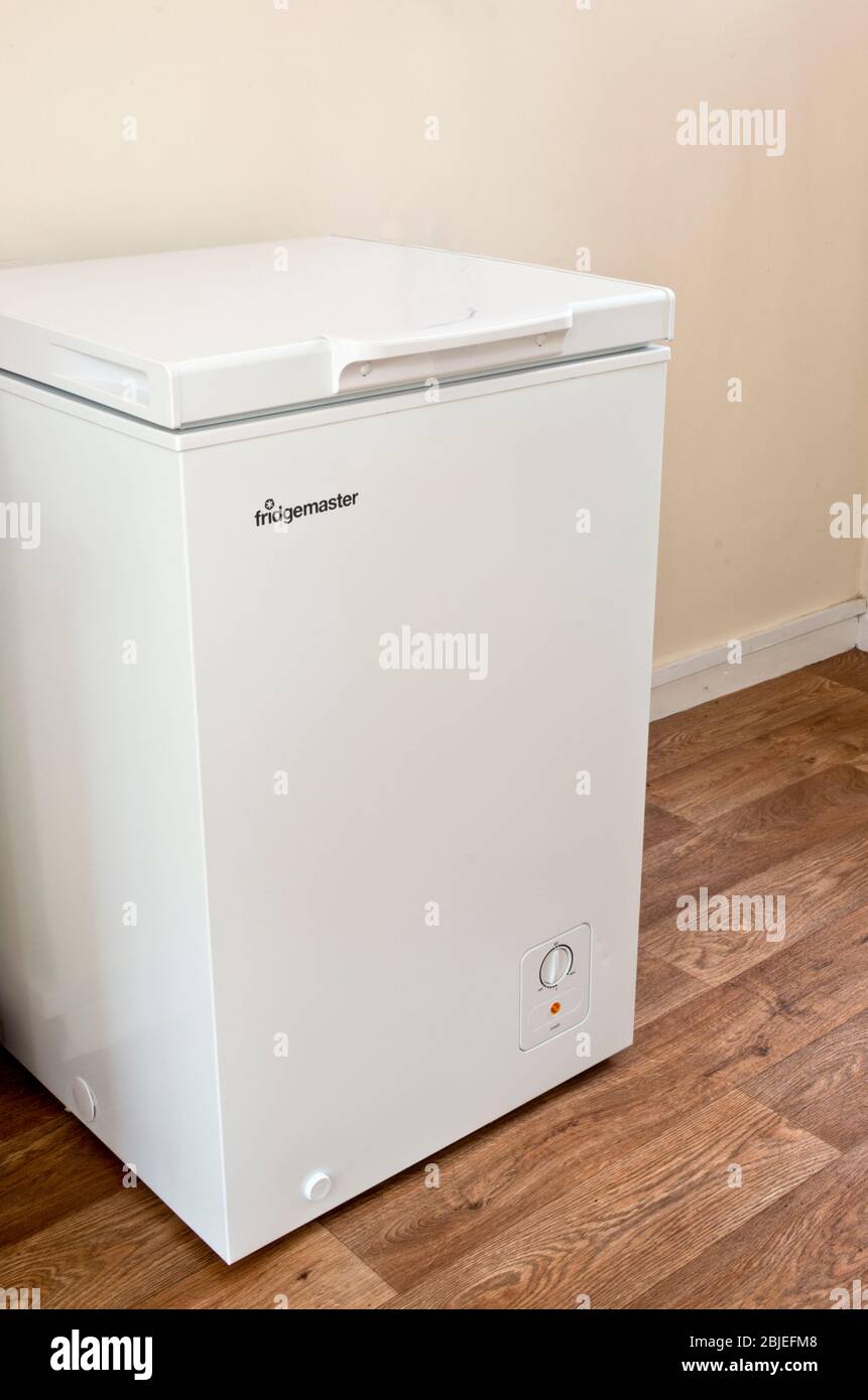 Fridgemaster Domestic Upright Chest Freezer Appliance or White Goods In A Home Environment Stock Photo