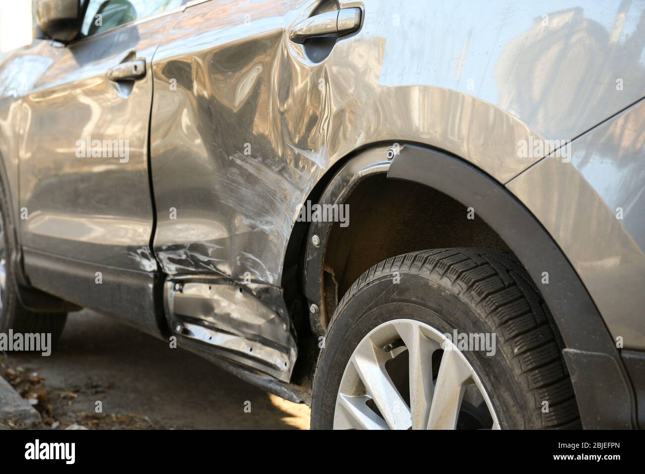 Damaged grey car hi-res stock photography and images - Alamy