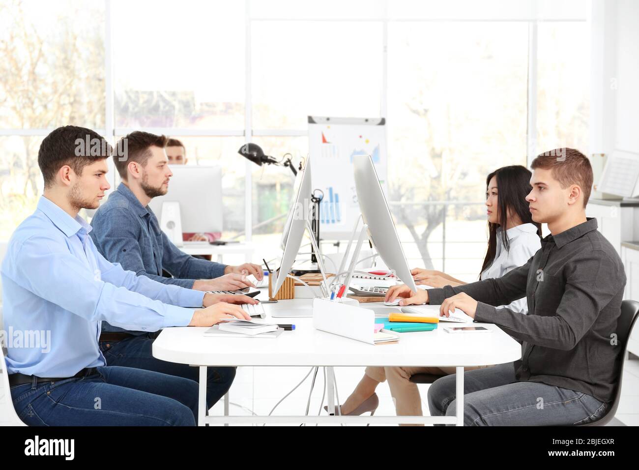 Young programmers working in office Stock Photo
