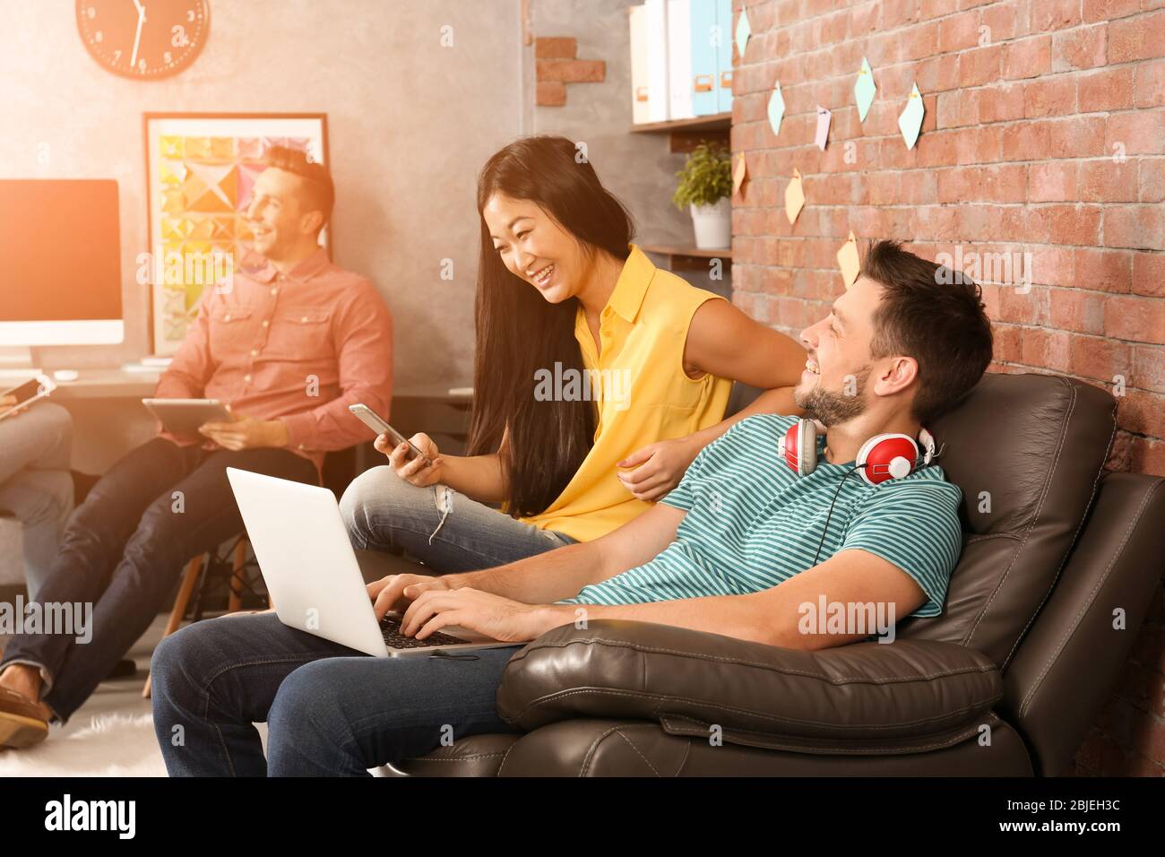 Young programmers resting in office Stock Photo
