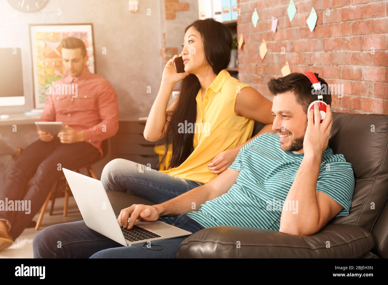 Young programmers resting in office Stock Photo