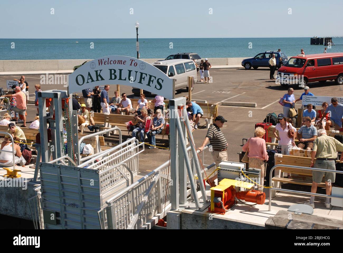 Martha's Vineyard, Massachusetts - September 2008: People waiting for the ferry on the harbor side in Oak Bluffs Stock Photo