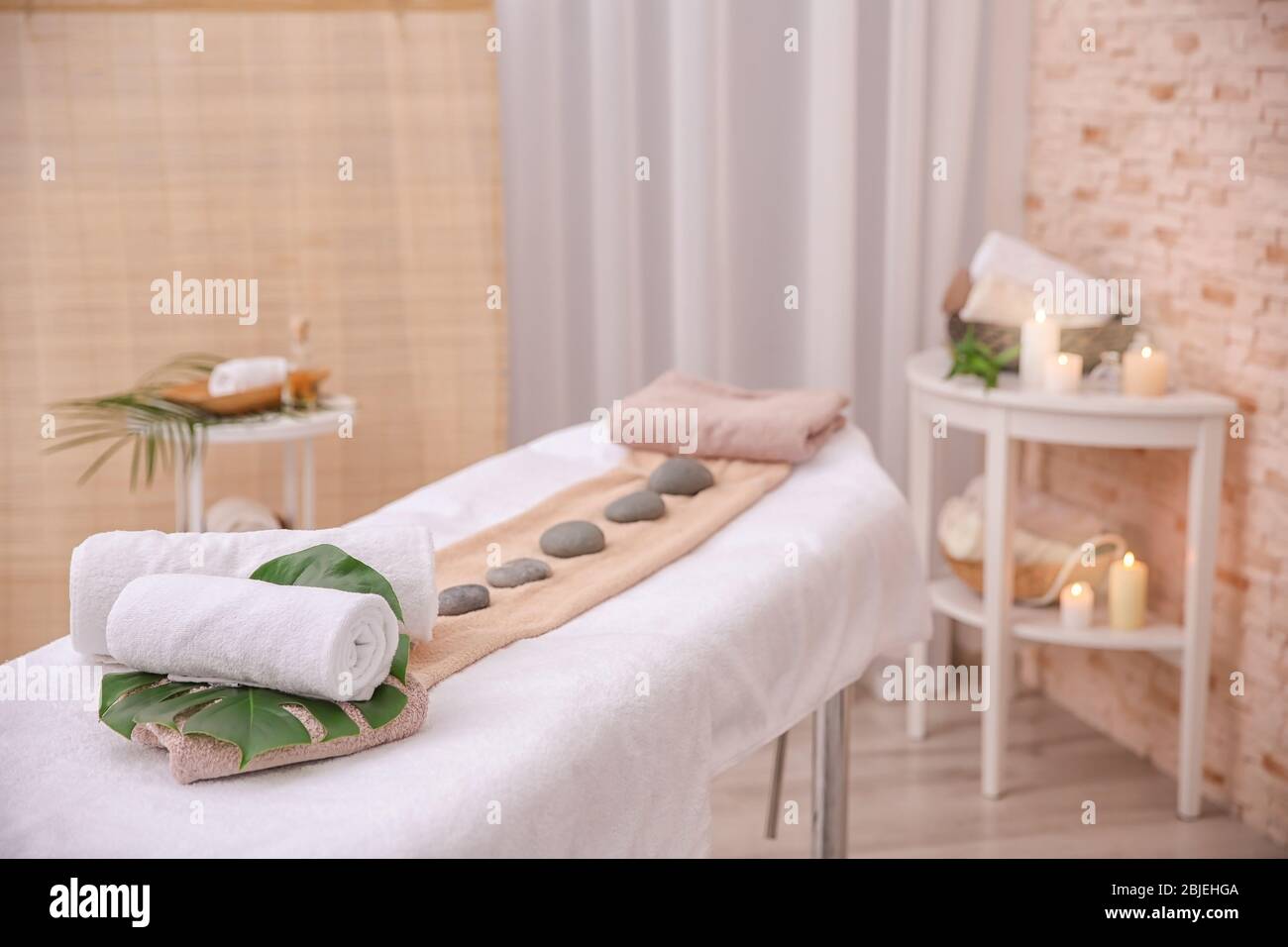 Interior of massage room in modern wellness center Stock Photo - Alamy