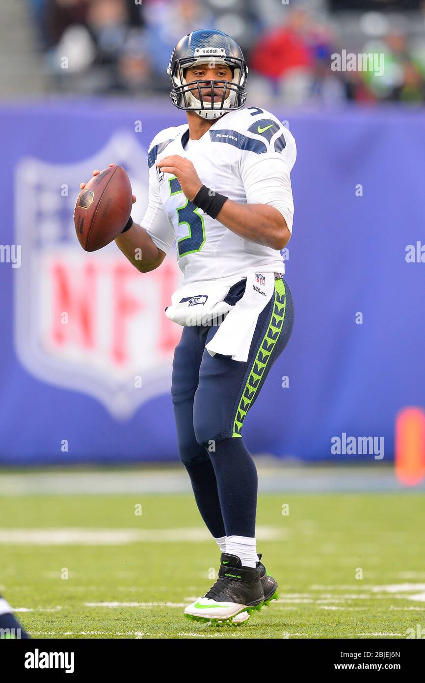 December 15, 2013: Seattle Seahawks quarterback Russell Wilson (3) looks to pass during the first half of a NFL game between the Seattle Seahawks and Stock Photo