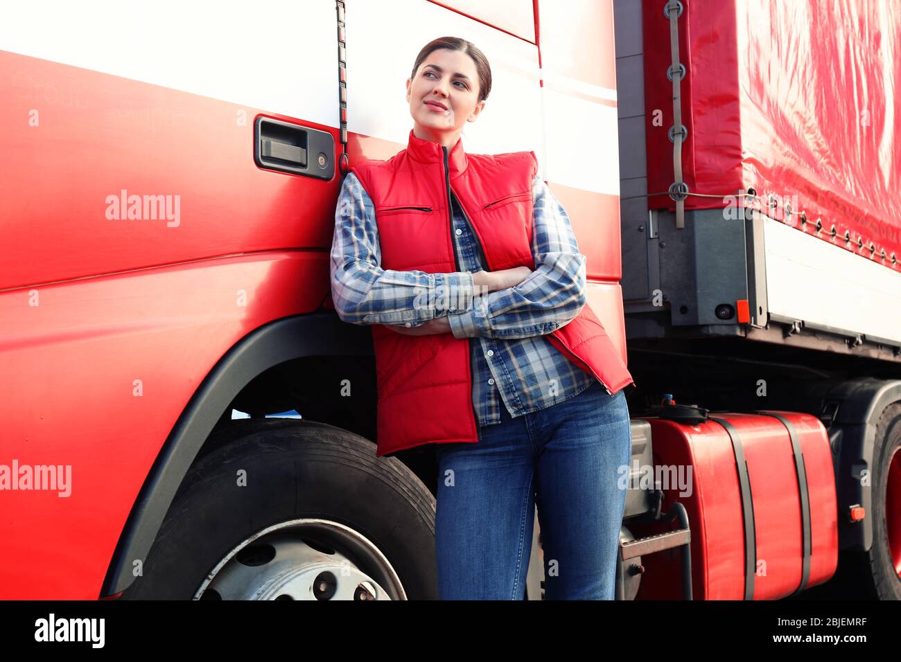 Young female driver near big modern truck outdoors Stock Photo - Alamy