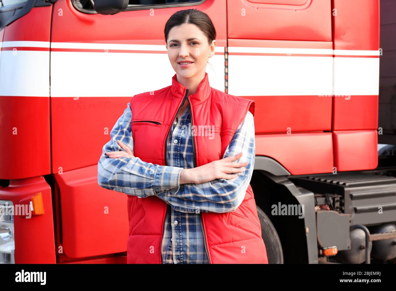 Young female driver near big modern truck outdoors Stock Photo - Alamy