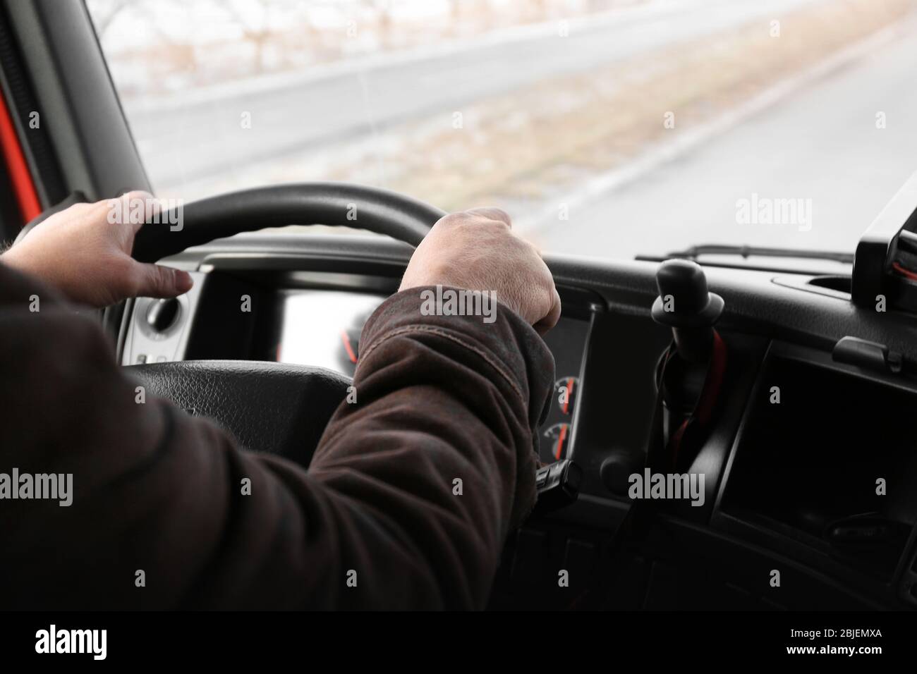 Elderly man driving big hi-res stock photography and images - Alamy
