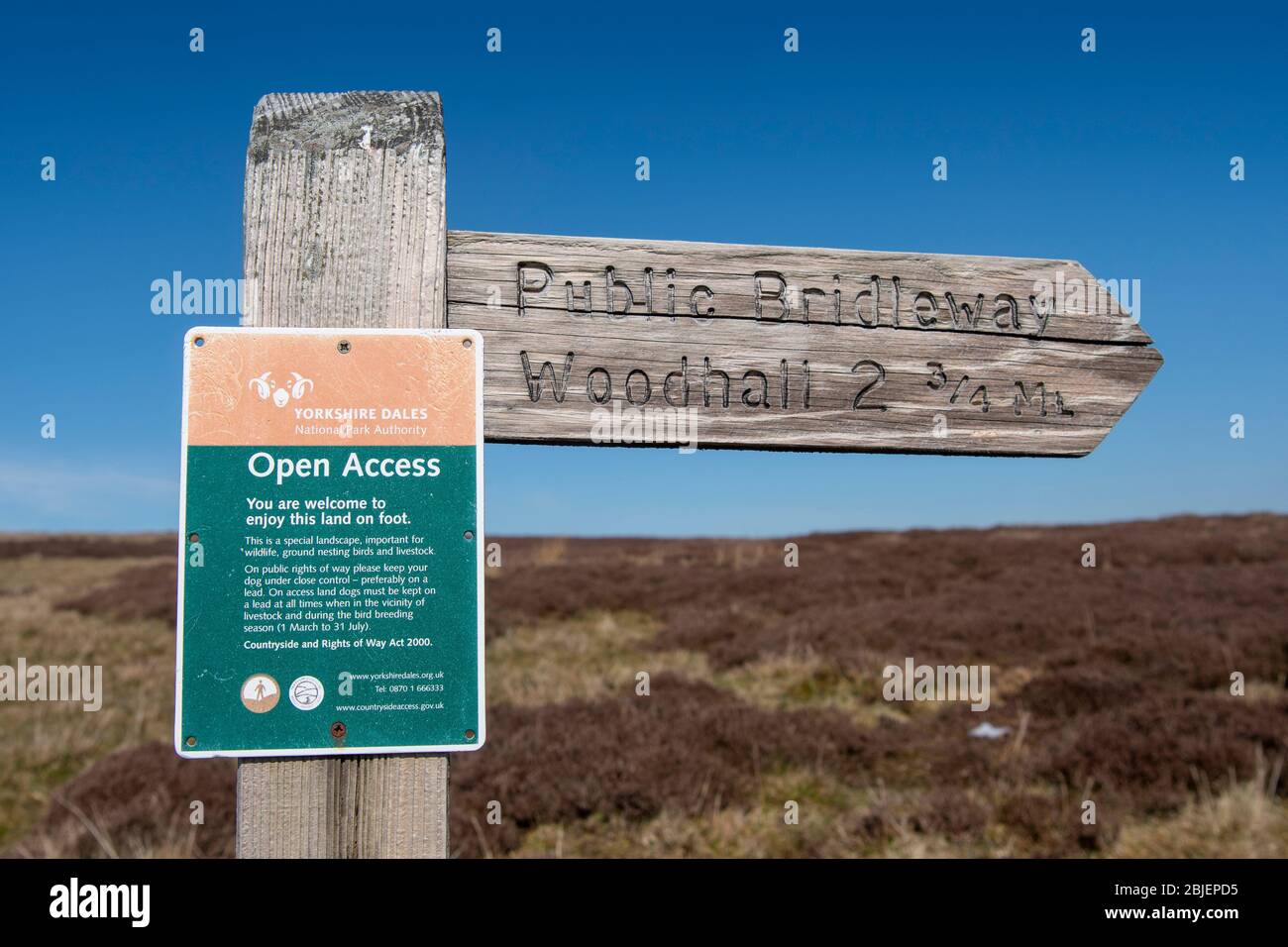 Bridleway sign across a moor in Wensleydale, North Yorkshire, advising visitors try not to disturb nesting birds. Yorkshire Dales National Park, UK. Stock Photo