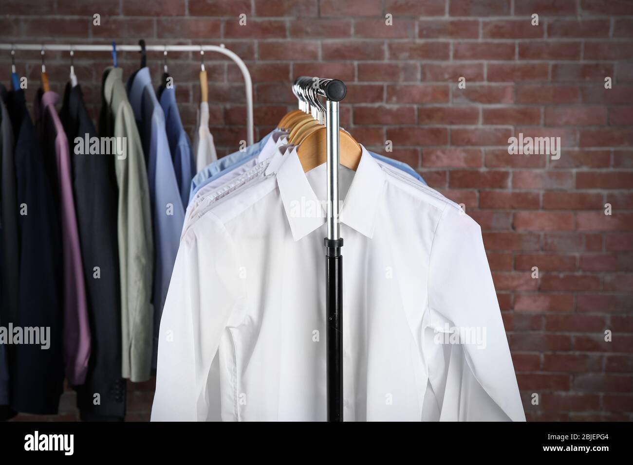 Dry cleaning hanger hi-res stock photography and images - Alamy